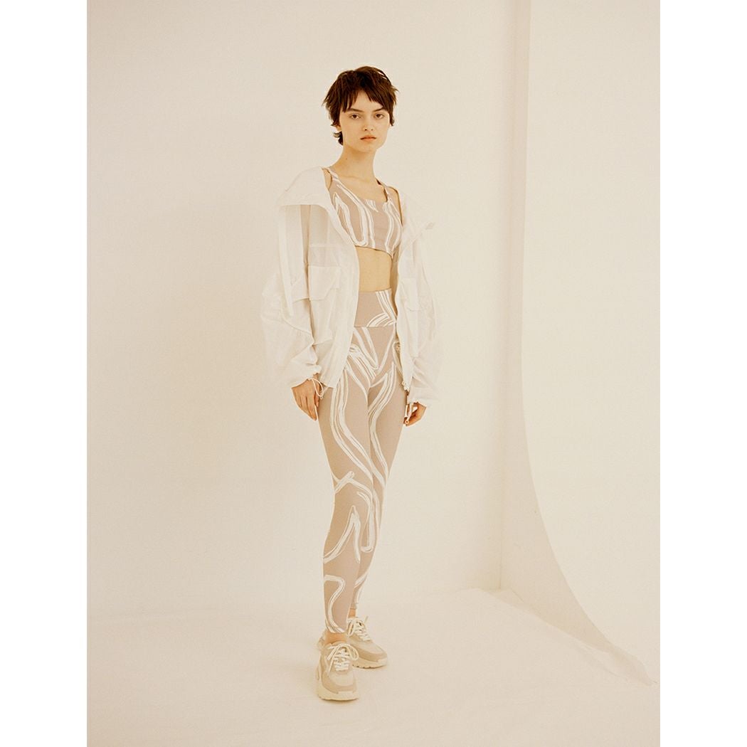 エミ emmi emmi yoga ニュアンスパターンレギンス レディース ベージュ